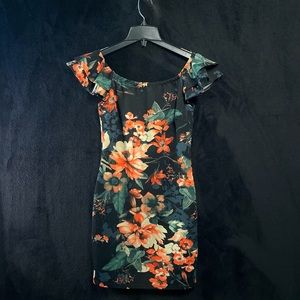 Latin Boutique Flowery tight dress, selling because I have to many dresses